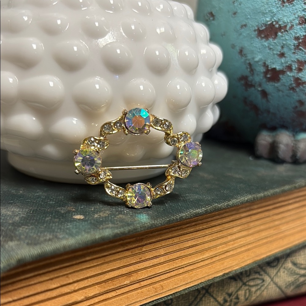 Elegant Gold and Iridescent Crystal Brooch